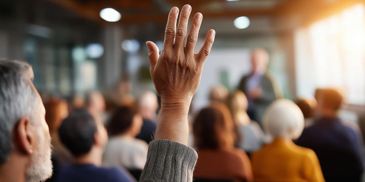Faceless diverse community members gathering at neighborhood mee